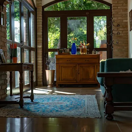 Argiolas לינה וארוחת בוקר 3*