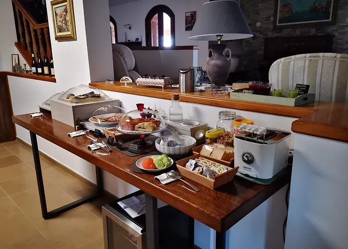 Alojamento de Acomodação e Pequeno-almoço Argiolas Modena